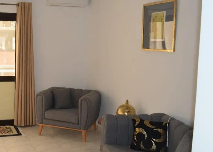 A Rare Find Spacious Modern Arabic Style In Beautiful A Building With An Host Also Has A Grand Rooftop Terrace With Mountain And Sea Views 15 Mins From Airport شقة